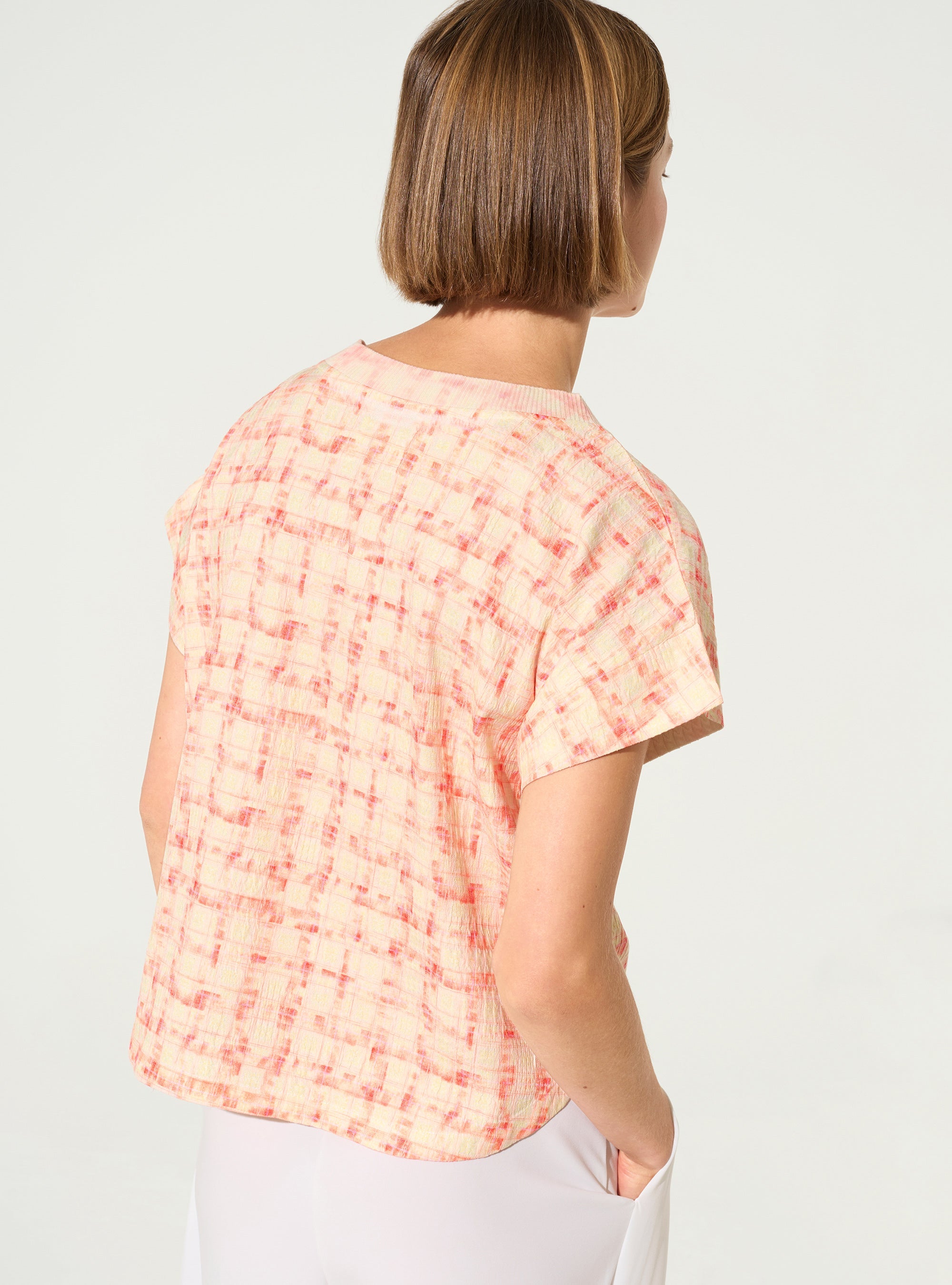 straight pleated blouse with orange print