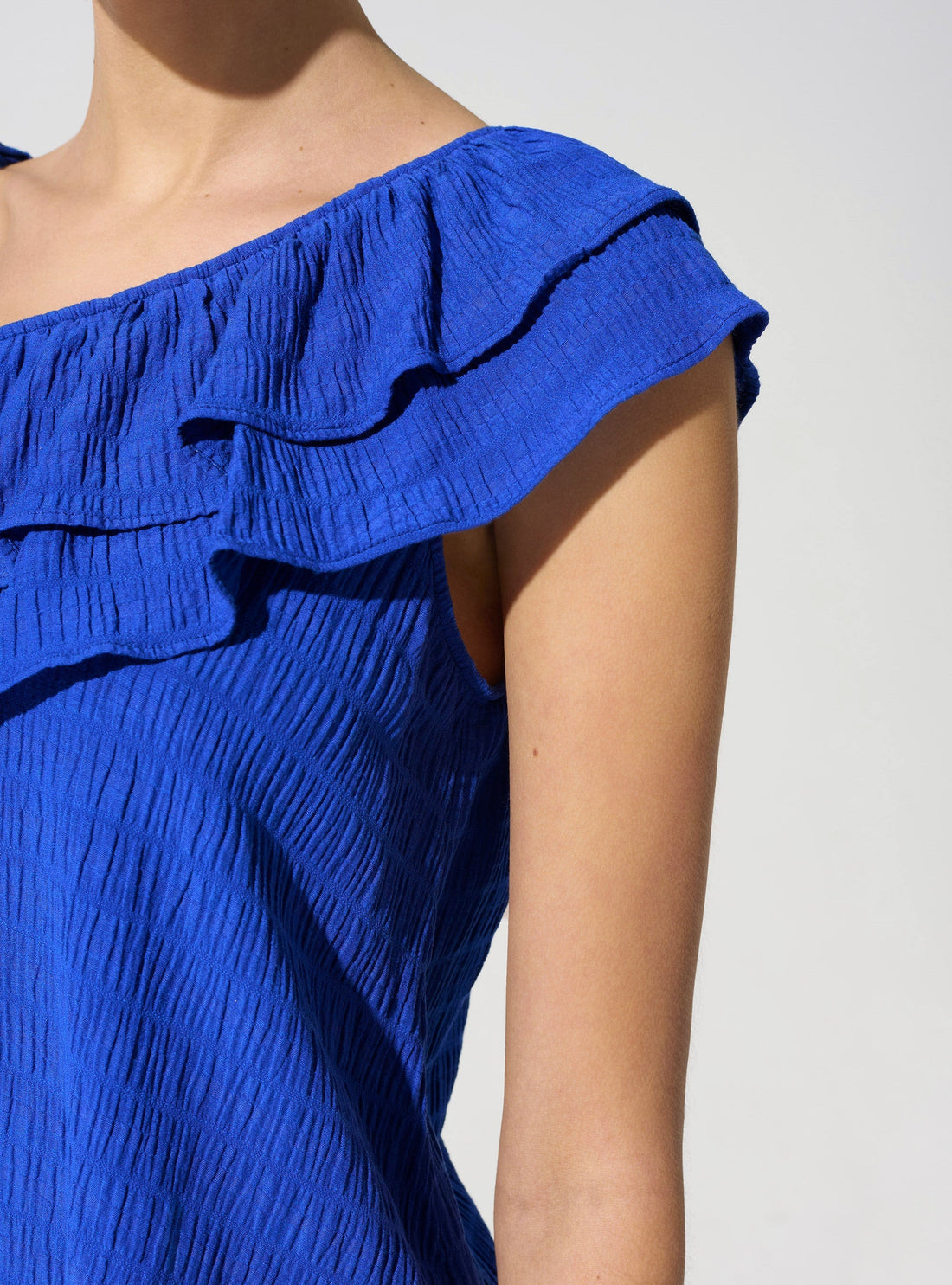 Top asymétrique acoté 