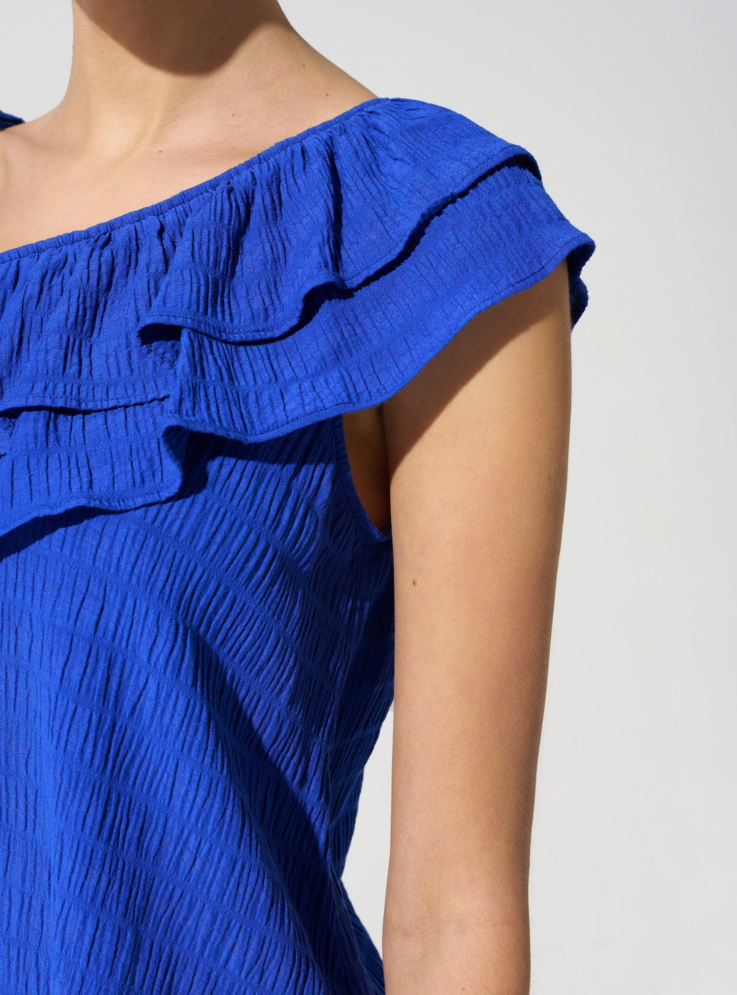Top asymétrique acoté 