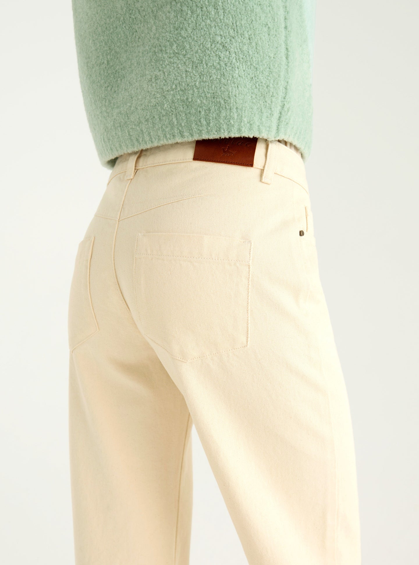 Jean flare taille haute acoté 