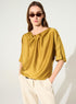loose yellow satin blouse