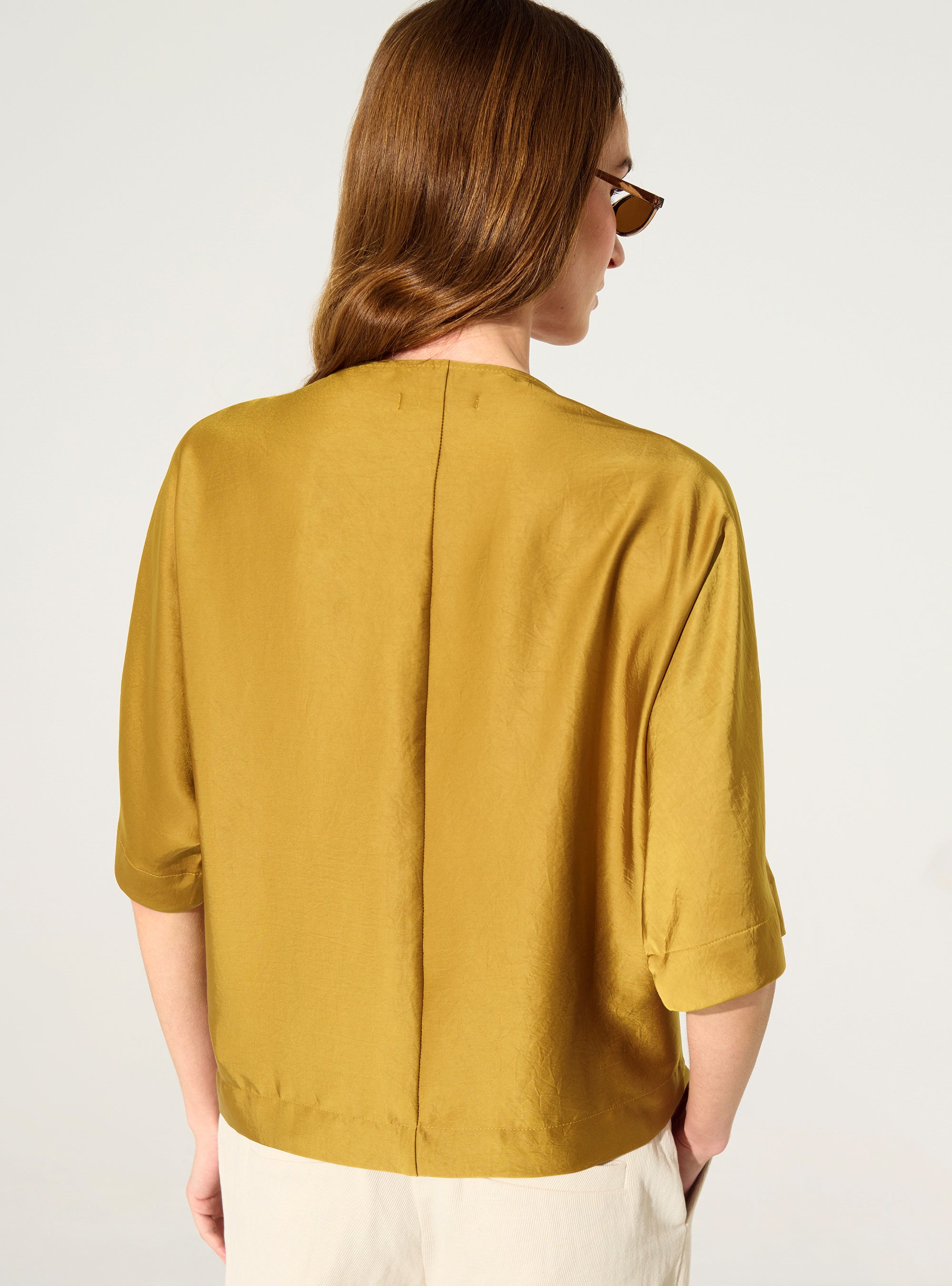 loose yellow satin blouse