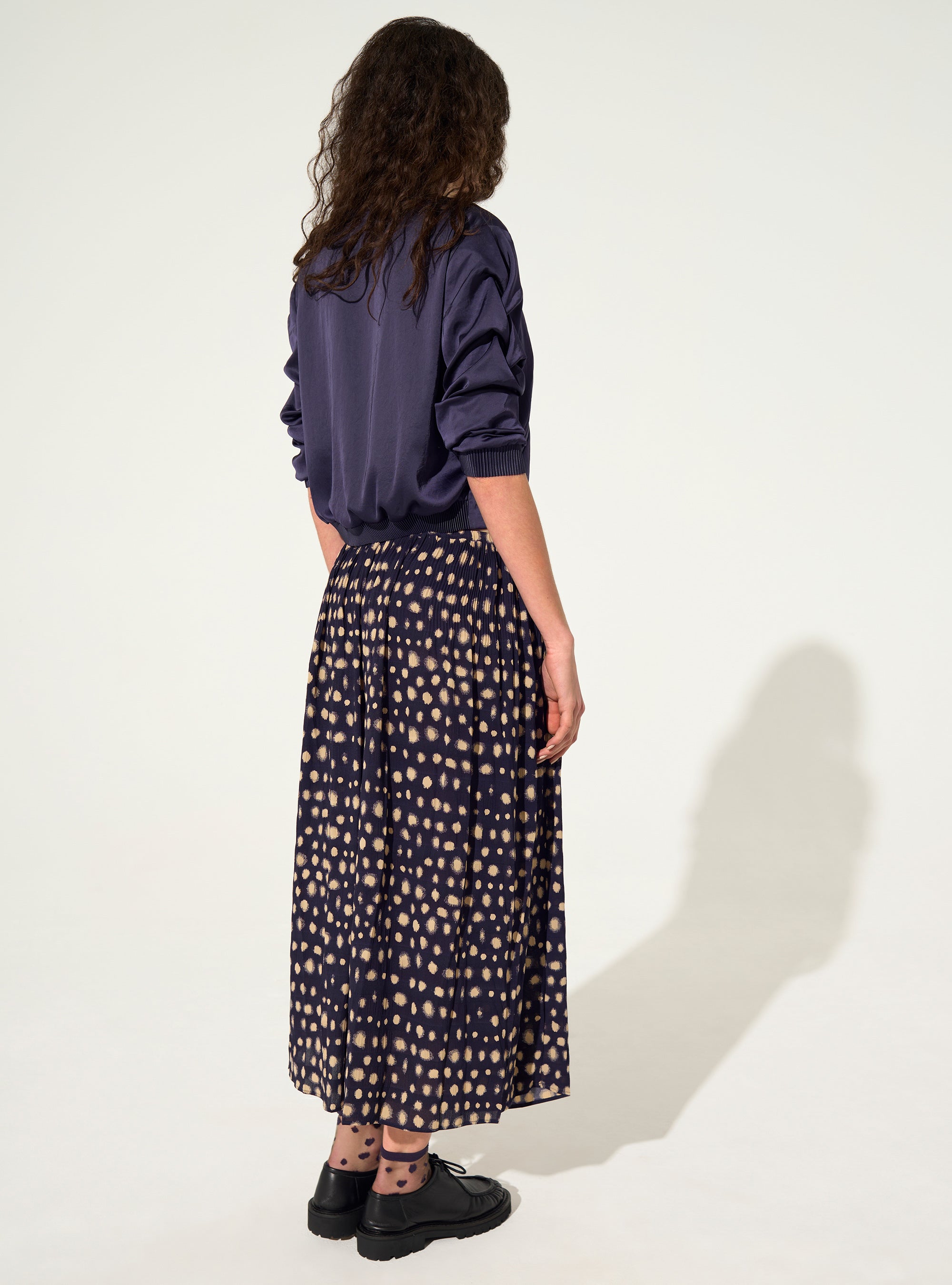 Jupe midi plissée imprimé maison violette